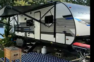 Linda’s 2022 travel trailer with bunkhouse & outdoor kitchen