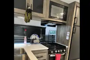 Linda’s 2022 travel trailer with bunkhouse & outdoor kitchen