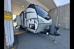 Half ton and family friendly Keystone Cougar 31 BHKWE Travel Trailer