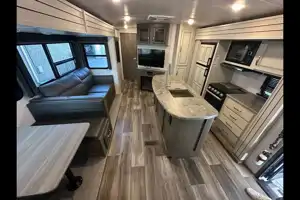 Half ton and family friendly Keystone Cougar 31 BHKWE Travel Trailer
