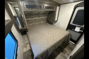 Half ton and family friendly Keystone Cougar 31 BHKWE Travel Trailer