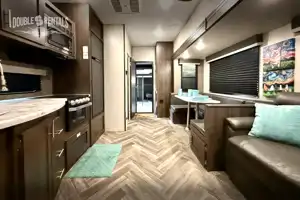 SPORTSTER Toy Hauler with 2 Queen Beds, U-Shaped Dinette & Sofa