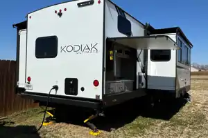 The 4G's Dutchmen Kodiak Ultimate Travel Trailer