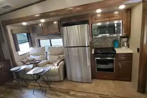 Beautiful Couples Coach- King size bed!