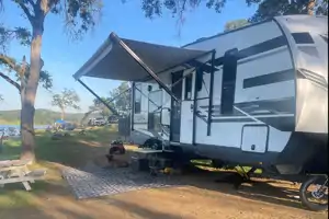 2021 30ft. Toy hauler with free kayaks and paddle boards