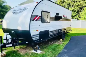Pettie Family-Size Forest River Wildwood FSX 179DBK Travel Trailer
