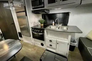 TRAIL RUNNER Bunkhouse w/ Queen Bed, Fold-Out Sofa & Dinette