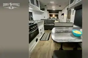 TRAIL RUNNER Bunkhouse w/ Queen Bed, Fold-Out Sofa & Dinette