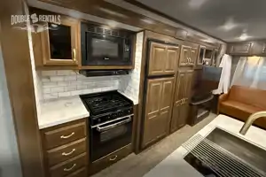 SIGNATURE w/ Private Master, Kitchen Island, Elec Fireplace & Outdoor Kitchen