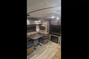 Kim & Scott's Cozy Camper (Forest River Surveyor)