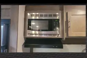 Kim & Scott's Cozy Camper (Forest River Surveyor)