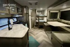WILDWOOD X-LITE Bunkhouse w/ Keyless Entry, Private Master & Elec Fireplace