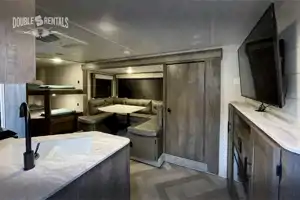 WILDWOOD X-LITE Bunkhouse w/ Keyless Entry, Private Master & Elec Fireplace