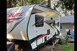 Toy hauler in the trees