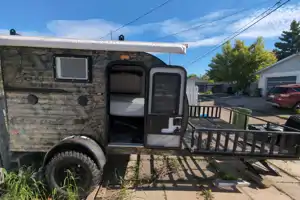 Camo Sunset Park RV Sunray Micro Trailer with toy hauler on front