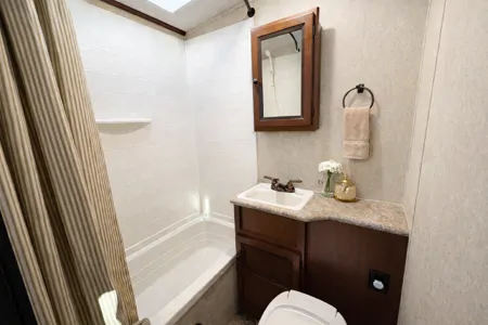 Family Adventure RV w/ 55” Projector | Luxury • Bunks • Half Ton Towable