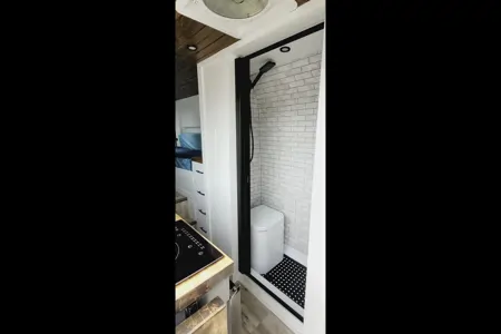 Cozy custom crafted van with Shower, Toilet, Heat, Solar and more!