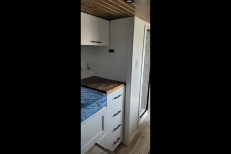 Cozy custom crafted van with Shower, Toilet, Heat, Solar and more!