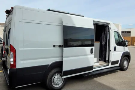 Cozy custom crafted van with Shower, Toilet, Heat, Solar and more!