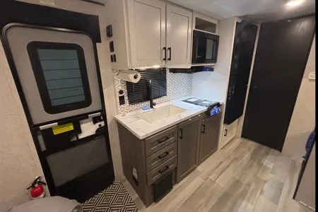 King Family’s Highland Ridge Open Range Travel Trailer (SUV towable)