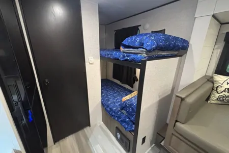 King Family’s Highland Ridge Open Range Travel Trailer (SUV towable)
