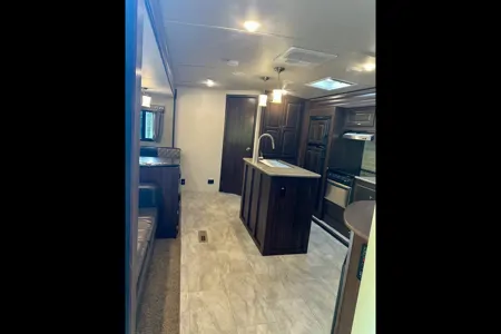 The Hutchins' Palomino 312TSQBK Travel Trailer