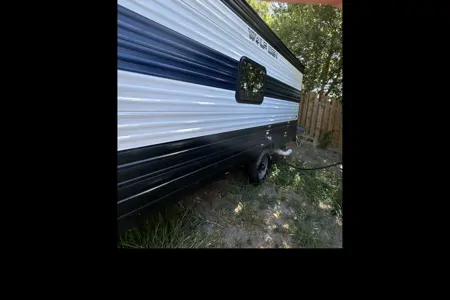 Valentino's Forest River Cherokee wolf den Travel Trailer