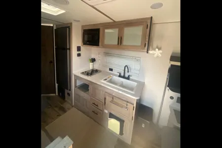Sunny & Harvey’s 2024 Grand River 22mb Travel Trailer