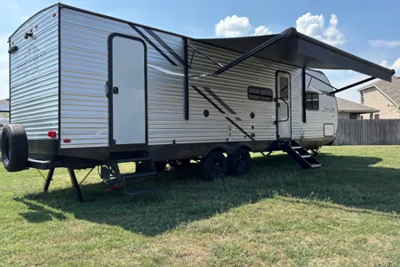 34ft camper sleeps 8-9 (delivery required)