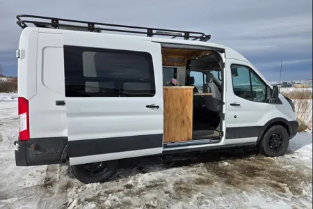 Cozy and Versatile Camper Van - Adventure Ready Ford Transit