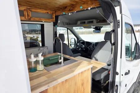 Cozy and Versatile Camper Van - Adventure Ready Ford Transit