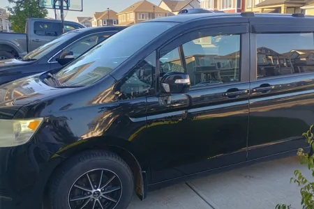 Honda  Camper (8 seats/2 sleeps) Queen bed+Airport pickup