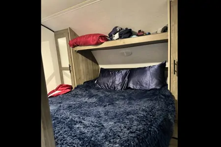 Linda’s 2022 travel trailer with bunkhouse & outdoor kitchen