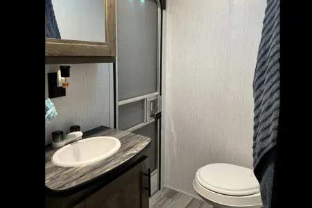 Linda’s 2022 travel trailer with bunkhouse & outdoor kitchen