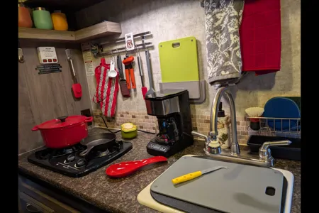 Cozy Red Winnie Drop • Not your typical travel trailer