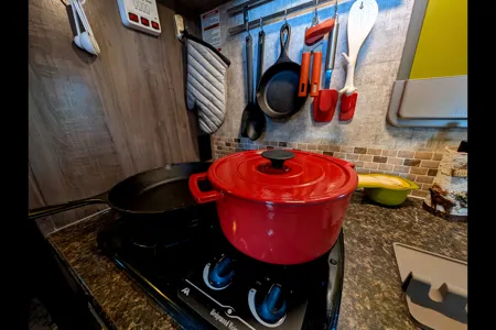 Cozy Red Winnie Drop • Not your typical travel trailer