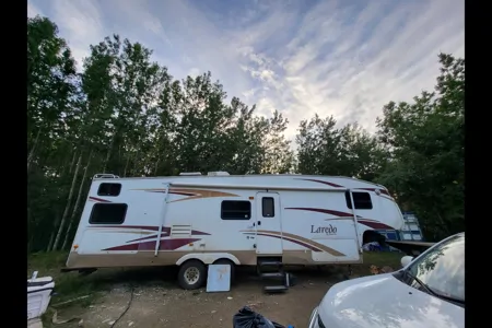 M T'S Keystone Laredo Fifth Wheel