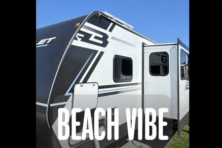 Raymond's Keystone Bullet 2840 QB Travel Trailer