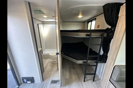 The Traveler Keystone Coleman 22BX Light Travel Trailer