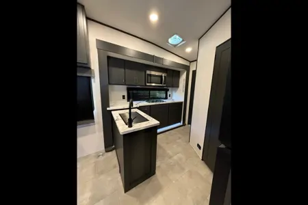 Aracely’s Forest River Sandstorm Toy Hauler