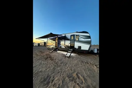 Aracely’s Forest River Sandstorm Toy Hauler