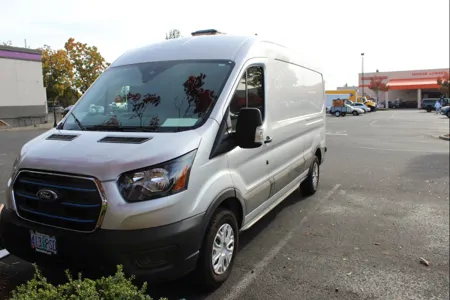 All-Electric 2023 Ford Camper van with Wifi, Office & Comforts!