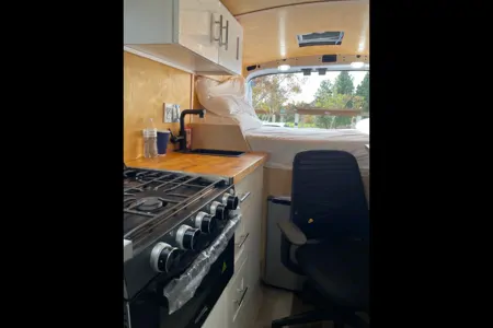 All-Electric 2023 Ford Camper van with Wifi, Office & Comforts!