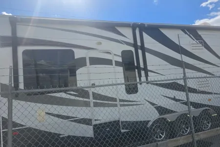 Longhorn Customs 2014 Dutchmen Voltage Fifth Wheel Toy Hauler your home away from home