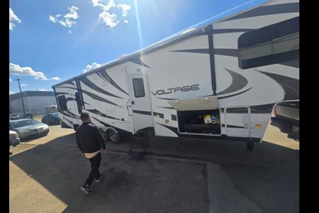 Longhorn Customs 2014 Dutchmen Voltage Fifth Wheel Toy Hauler your home away from home