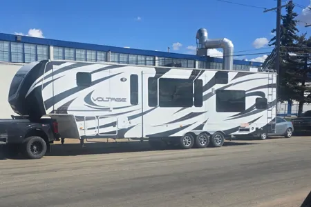 Longhorn Customs 2014 Dutchmen Voltage Fifth Wheel Toy Hauler your home away from home