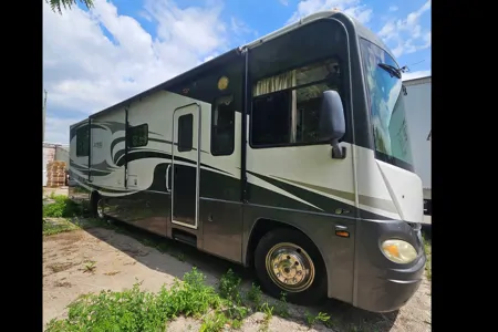 Sully's Coachmen Aurora Class A