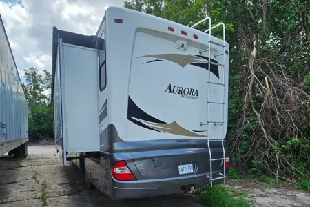 Sully's Coachmen Aurora Class A