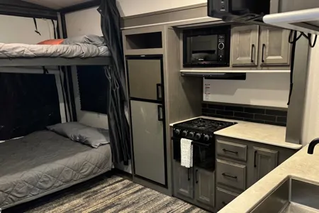 2021 30ft. Toy hauler with free kayaks and paddle boards