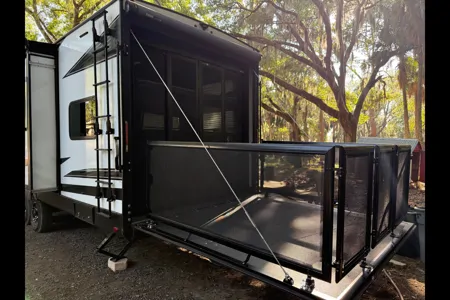 Moira's Mansion 2022 Grand Design Momentum Toy Hauler